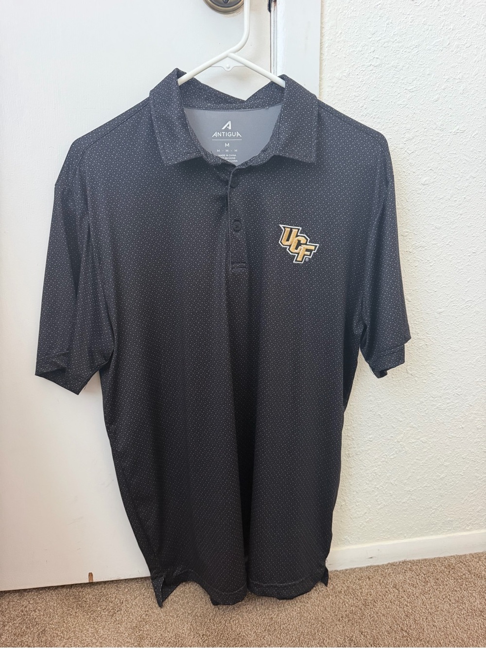 Antigua Black UCF Logo Men's Polo